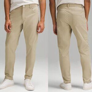 Lululemon ABC Slim-Fit Warpstreme Pants Beige Khaki Travel LM5AD9S Mens Size 33